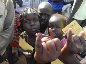 Children show where vaccination was received