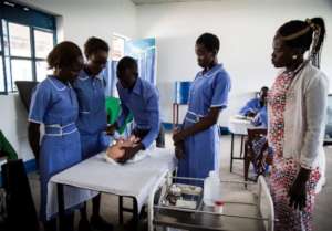 Demonstrating proper newborn care to students