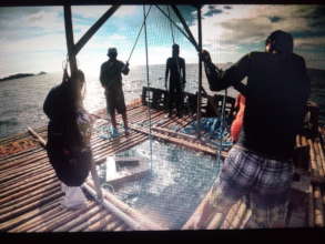 The team prepares to plunge the artificial habitat