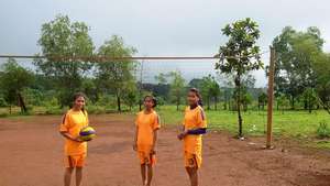 PEI Scholars receiving sport suit and volleyball
