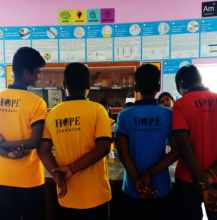 Boys listening to  the teacher