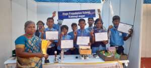 Students with their medals and certificates