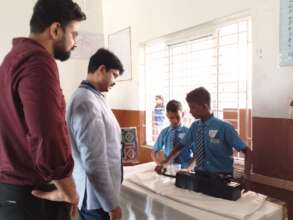 HOPE school students explaining their project