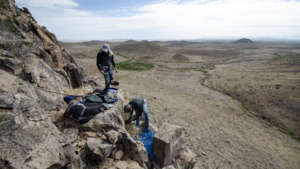 Careful rock-climbing to unmount the camera.