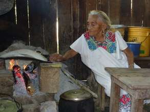 Apolinaria's traditional bonfire pre-cookstove