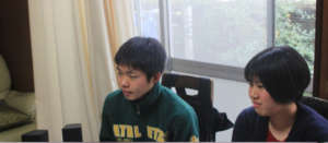 2 of the Tohoku students in a preparatory meeting