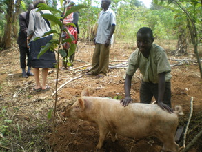 Kitovu project staff and Britt in the family