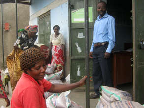 Small Holder Farmers Picking up Bean Seeds
