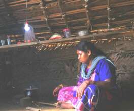 One Beneficiary Tribe women cooking in solar light