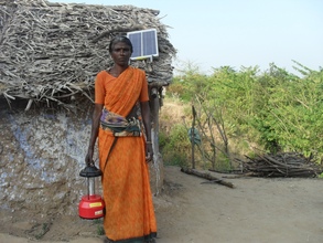 P. Lakhmi with solar lantern provided