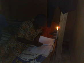 Reading by Candle Light