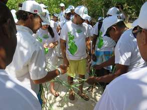 Tropigas Foundation employees building a nursery