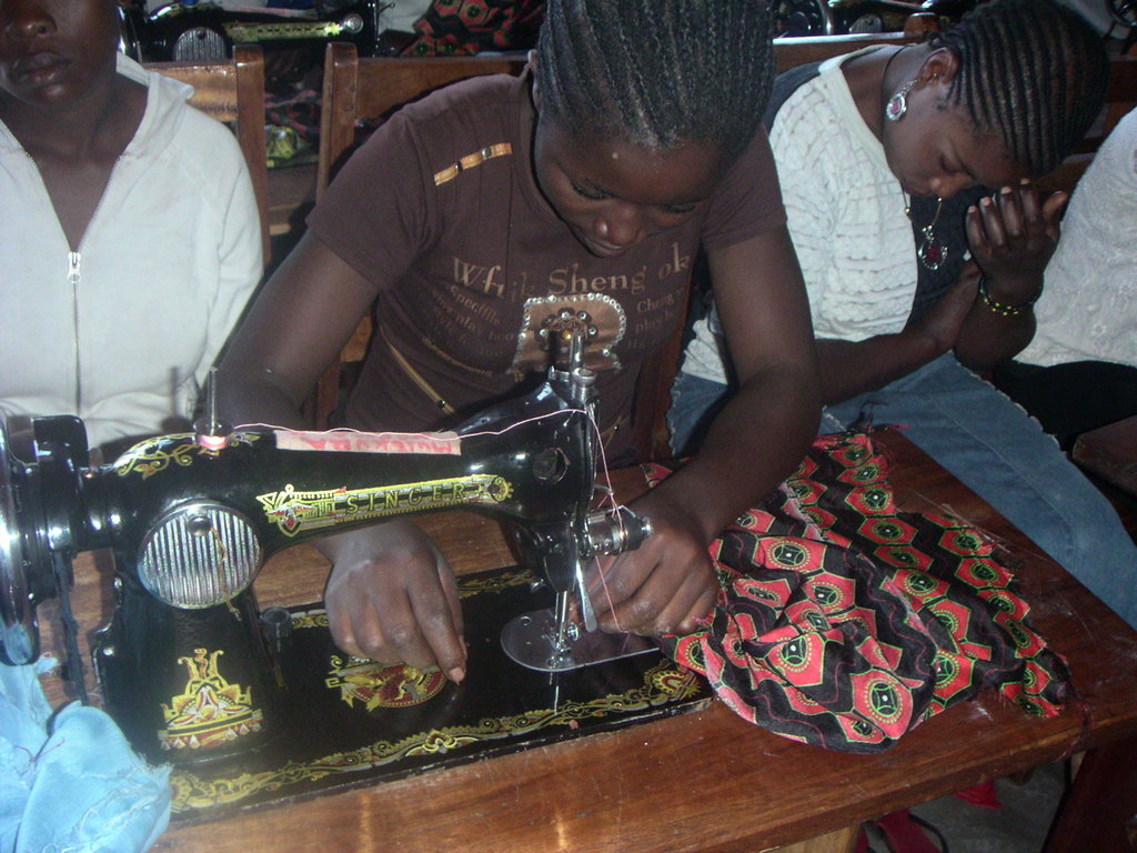 GIrl making business in sewing CV Goma