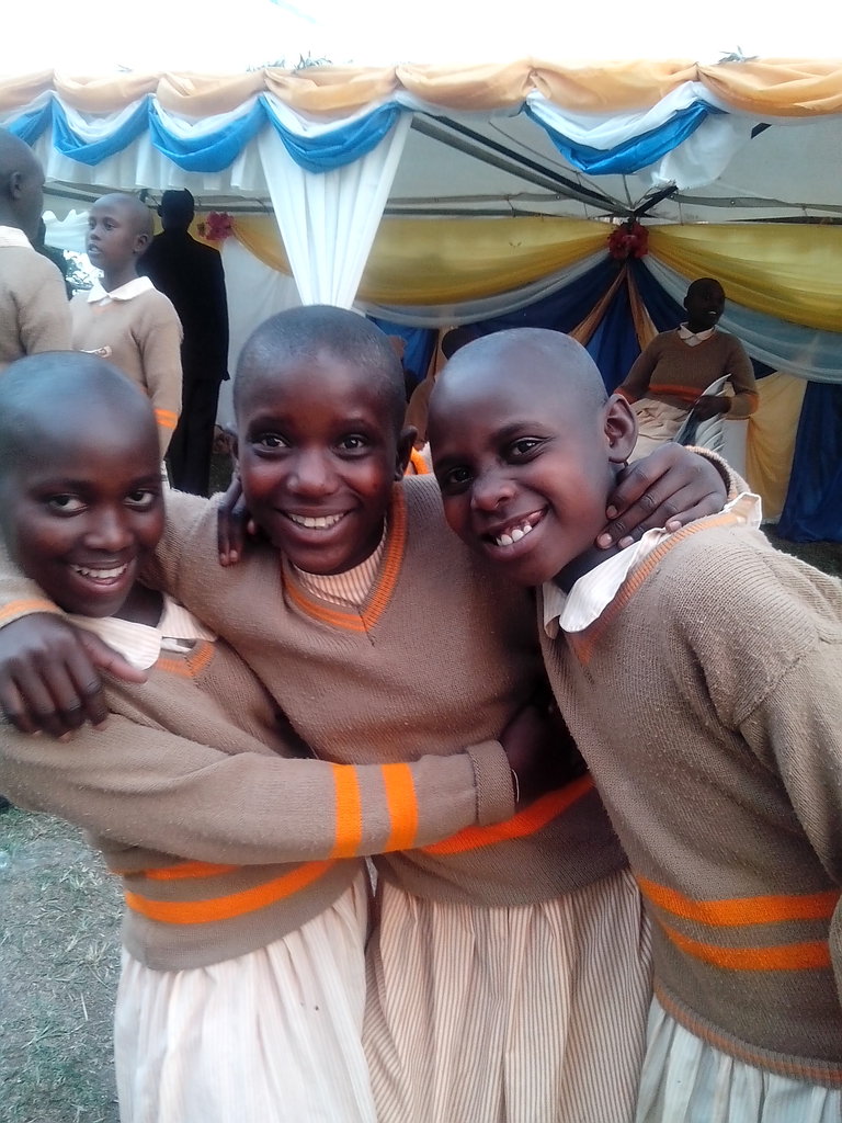 Anna, Winie and Babra smart in school uniforms
