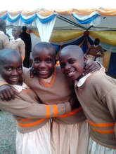 Anna, Winie and Babra smart in school uniforms