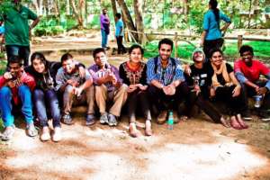 The volunteers and the boys taking a water break!