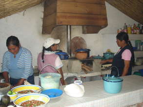 Cooking with the women in the community