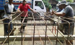 Community members working on the bridge 2