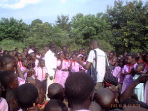 Moses engages kids and teachers at Kiwolera Army