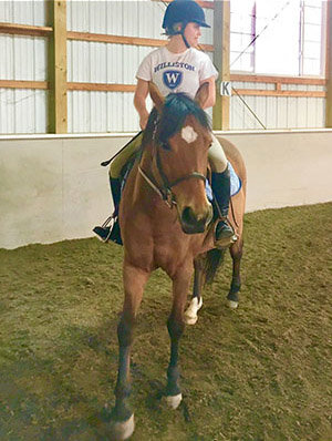 Alexi Goodman aboard Zoey at New Canaan Mounted Tr