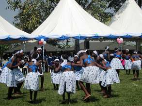 Children dance and celebrate anniversary.