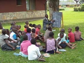 Remedial lessons in progress at the village.