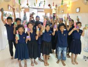 Children received toothpaste and brushes