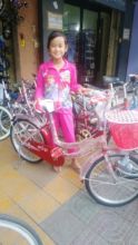 Rchana is very happy with her new bike.