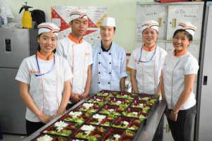 KOI Bento cook and students