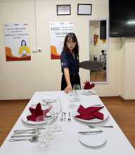 Ly Tho Go during a practical F&B training session