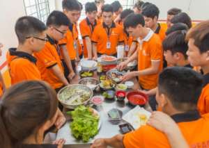 Students at our new cooking class in Hanoi