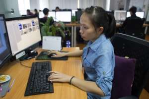 A Web&Graphic Design graduate at her workplace