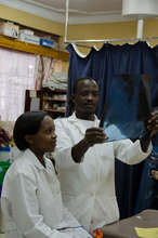 ECP's Jovita and JB reviewing an x-ray