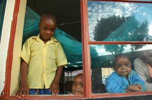 Good looking kids in window at Nyakibale