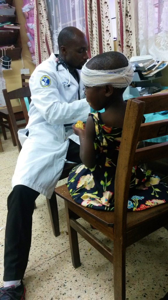 ECP- Richard doing a wound check on a peds patient