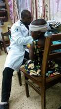 ECP- Richard doing a wound check on a peds patient