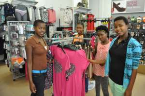 Teen girls shopping for much needed clothing