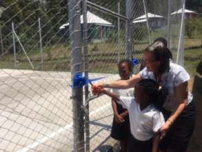 Dr. Elizabeth Hynd and Hephzibah Cutting Ribbon