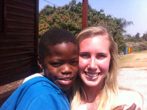Ms. Alana, one of our volunteers with student
