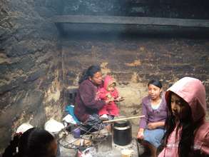 Isabel Feeds Baby with a Vitamin Supplement