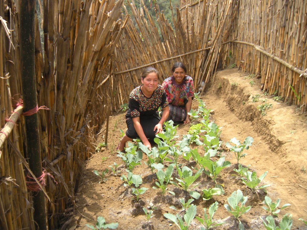 Josefa's cousin and mom, happy in their new garden