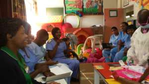 Rumbi taking nurses through a refresher course