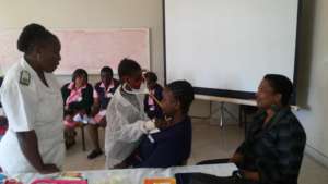 Dr Priscilla at work