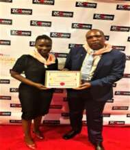 KidzCan Staff with Award