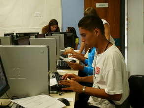 Young man in a course of technology