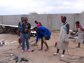 A class of our girls making burglar bars