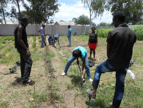 Our Seniors mapping out foundation for sewing bldg