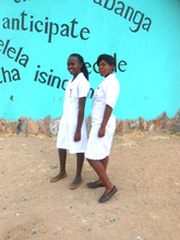 Thamani and Hloniphile in their nurse aide uniform