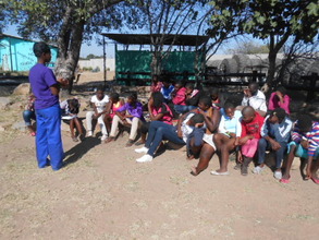 Samantha leads our girls club meeting