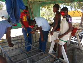 Our Elders constructing a bookcase